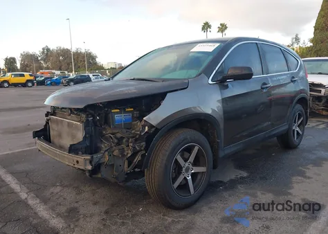 2014 Honda Cr-V Lx z USA, uszkodzony, nr VIN 5J6RM3H37EL014957